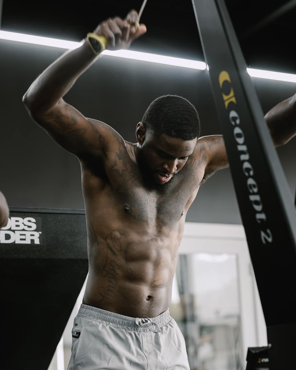 Athlete grinding through an all-out effort on the erg